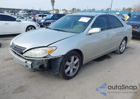 2002 Toyota Camry Le from USA, damaged, VIN JTDBE32K820024298
